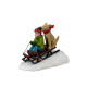 Figurine garçon et son chien en luge LEMAX